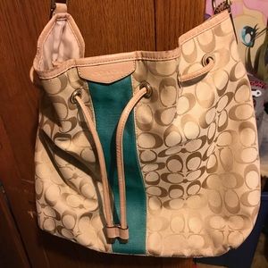 Coach Striped Signature C Drawstring Purse.